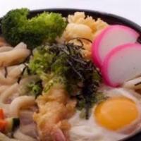 Nabe Udon · Noodle with shrimp tempura, chicken, egg and vegetables.