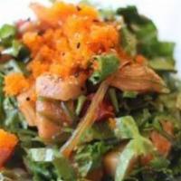 Poki Salad (spicy) · Assorted sashimi mixed with seaweed salad and vegetables.