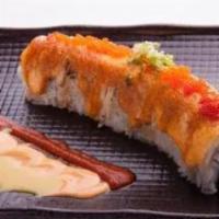 Explosion · Inside: shrimp tempura and spicy tuna, outside: torched albacore&tobiko