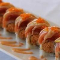 Island Roll · Inside: shrimp tempura and spicy crab, outside: spicy tuna, salmon, slice of lemon and fish ...