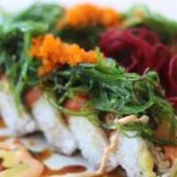 Monster · Inside: shrimp tempura, tuna, salmon, hamachi and avocado, outside: spicy tuna, seaweed sala...