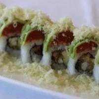 Sharks Roll · Inside: soft shell crab and avocado, outside: crunchy with spicy tuna and avocado.