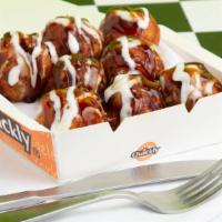 Takoyaki (8) · A Octopus Wheat Cake snack, served with ranch, teriyaki, and fish flake
