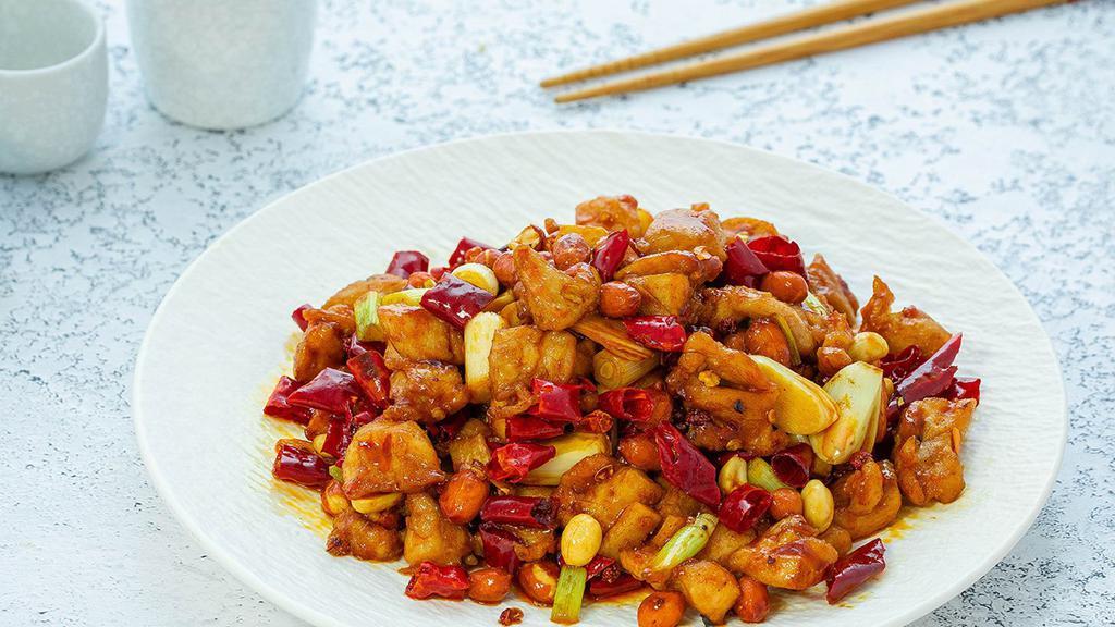 2. Kung Pao Chicken / 宫保鸡丁 · Spicy stir-fry.