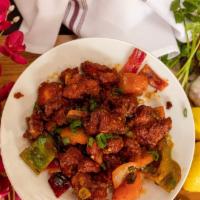 Chicken Manchurian · Taste from himalaya. Chicken fried with green chili, bell pepper, red onion, green onion, to...