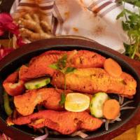 Tandoori Fish · Grilled fish fillet of the day seasoned with spices.