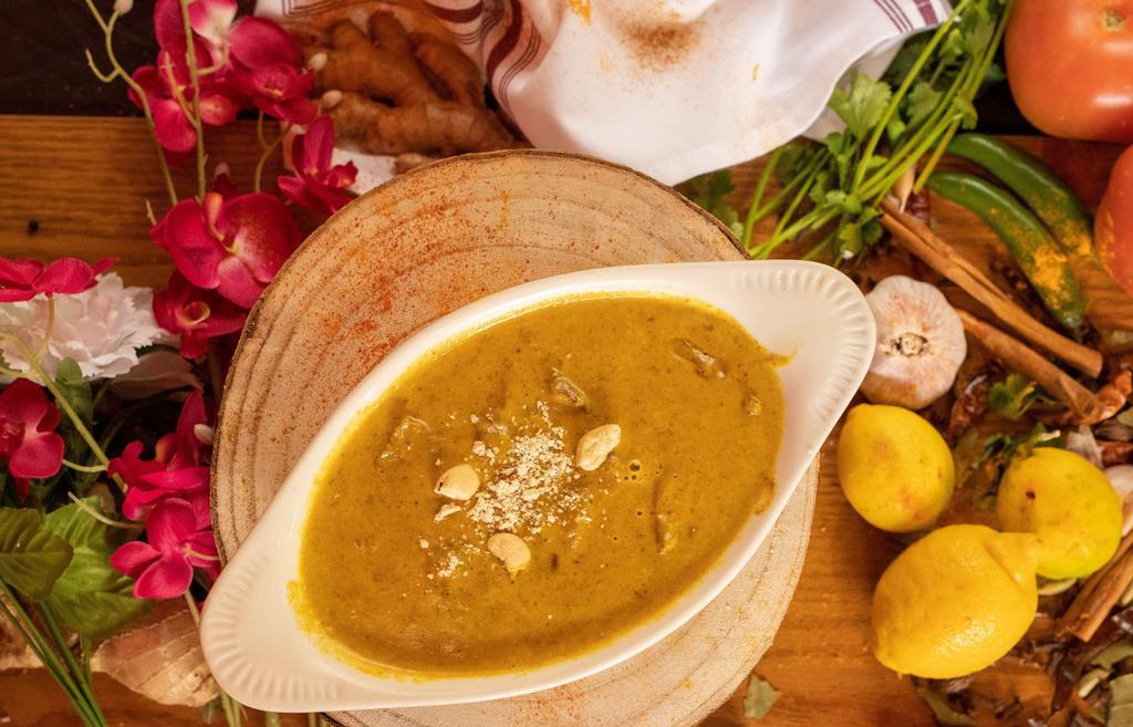 Navratan Korma · Blend of nine fresh vegetables cooked in tangy creamy tikka sauce.