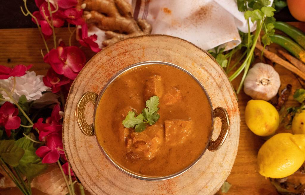 Chicken Tikka Masala · Chef's signature dish. Boneless chicken with the famous tikka masala sauce.