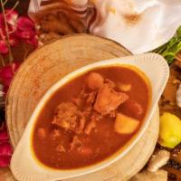 Chicken Vindaloo · Boneless chicken and fresh potatoes cooked in spicy vindaloo sauce.
