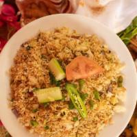 Vegetables Fried Rice · Basmati rice fried with some diced vegetables.