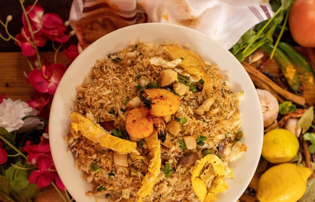 Mixed Fried Rice · Basmati rice fried with diced chicken, eggs, and some vegetables.