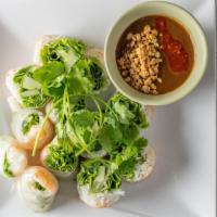 03 Fresh Prawn Rolls (2)/ Gòi Cuòn (2) · Steamed shrimps wrapped in rice paper with lettuce, bean sproùts & rice sticks, served with ...