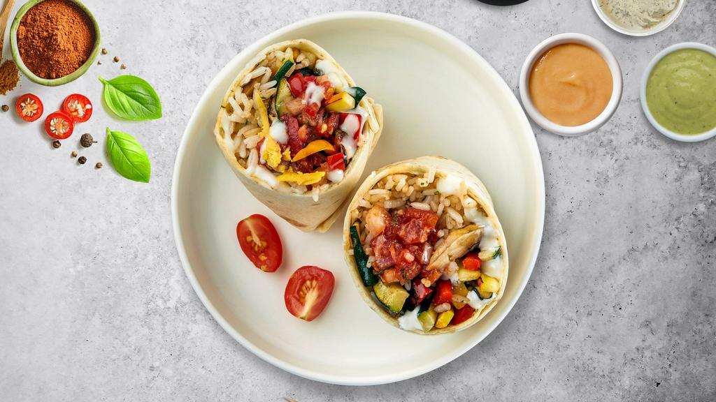 Veggie Voyager Burrito · Mixed Vegetables wrapped in a warm tortilla with sour cream, salsa, cheese, and spanish rice.