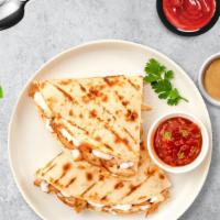 Shrimple Plan Quesadilla · Shrimp wrapped with cheese in a grilled tortilla