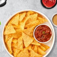 Chip Inn And Salsamazing · Warm up with toasty tortilla chips served with a side of tangy salsa