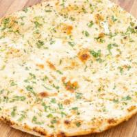 Garlic Naan · Delicious fresh garlic and cilantro topping whole wheat flour flatbread.