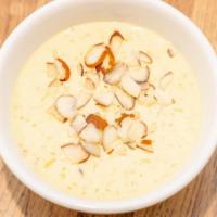 Kheer · Rice pudding in freshly cardamom flavor milk with saffron and nuts.
