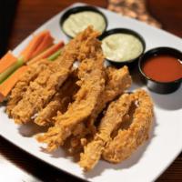 Angry Buffalo Seitan Strips · House-made seitan strips, served with our creamy ranch dressing, carrots and celery with hot...