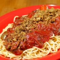 Creole Spaghetti · Olive oil glazed semolina pasta served with house-made spaghetti sauce starring tomatoes, pe...