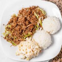 Kalua Pork with Cabbage · Smoke flavor succulent pork slowly roasted to perfection. A true island favorite.