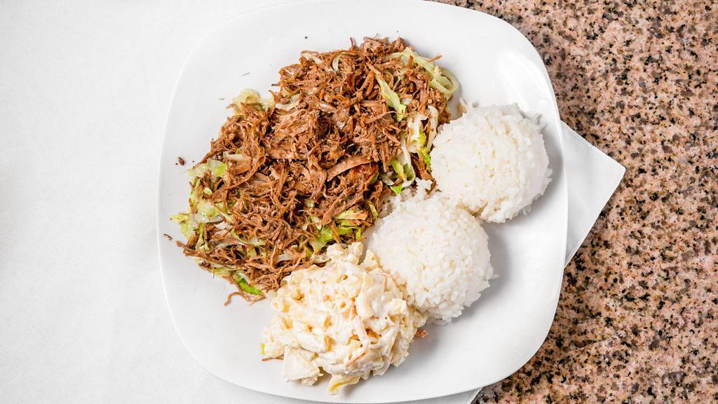 Kalua Pork with Cabbage · Smoke flavor succulent pork slowly roasted to perfection. A true island favorite.