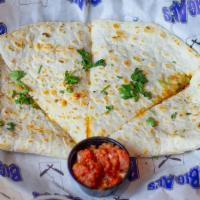 Quesadilla · Choose from beef piccada, chicken tinga or brisket