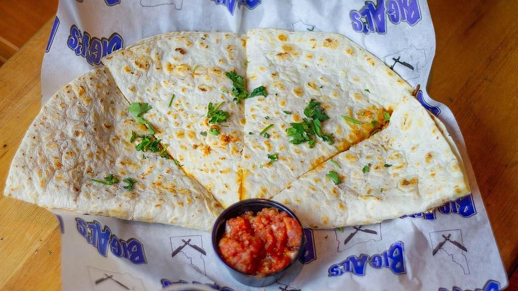 Quesadilla · Choose from beef piccada, chicken tinga or brisket