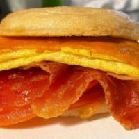 Bacon, Egg & Cheese Breakfast Sandwich · Freshly toasted English muffin with two strips of plant bacon, Just Egg and plant cheddar.

...