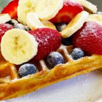 Belgian Waffle with Fresh Fruits and Powdered Sugar · Crispy and golden outside, fluffy inside: Our house-made Belgian waffle. Made fresh to order...
