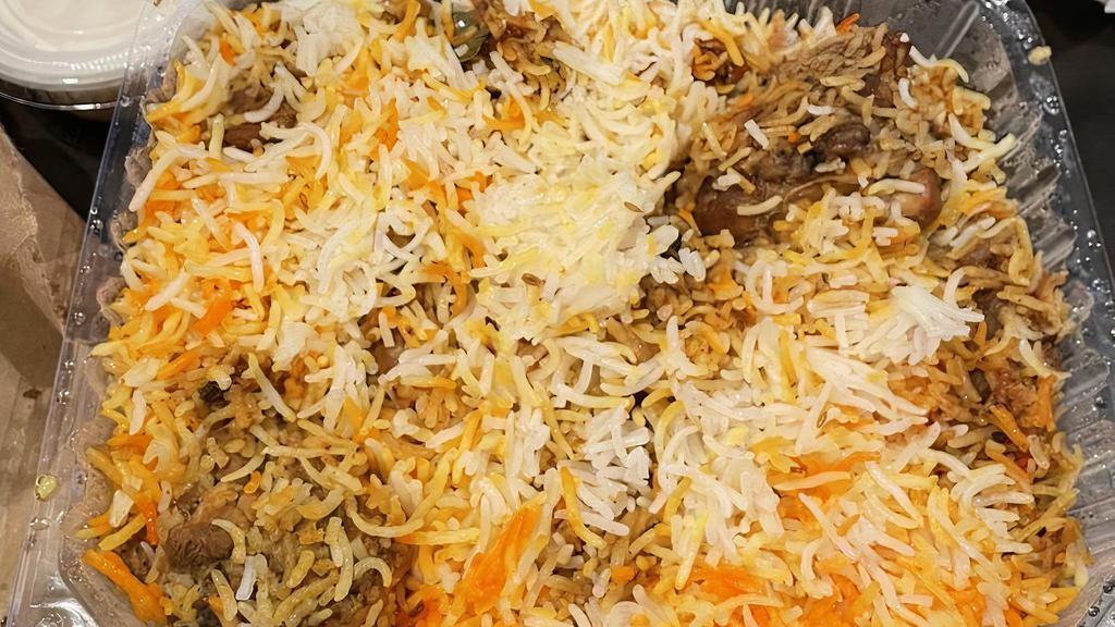 Lamb Biryani · Basmati rice marined with indian spices and lamb.