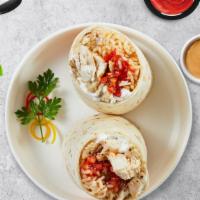 El Pollo Burrito · Grilled chicken topped with sour cream, salsa, cheese, and refried beans wrapped in a warm t...