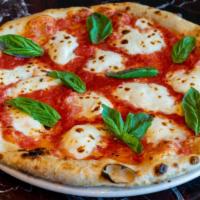Margherita Pizza · fresh mozzarella, tomato, basil, virgin olive oil