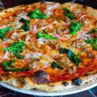 Salsiccia Pizza · calabrian chili pork sausage, mozzarella, tomato, red onions, broccoli