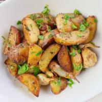 Arrosto · roasted Yukon gold potatoes, garlic, rosemary