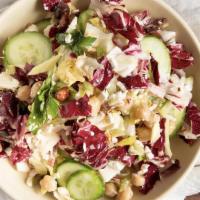 Chopped Salad · Radicchio, Fennel Salami, Chickpeas, Persian Cucumbers, Nicoise Olives, Roasted Almonds, Cel...