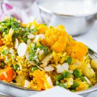 Vegetable Biryani · Assorted of vegetables mixed with saffron flavored basmati rice.