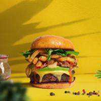 Locked and Loaded Burger  · Seasoned 1/3 plant-based patty, fries, light mayo, onion, lettuce, tomato, onion, and pickle...