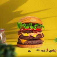 Cloned Classic Burger · Two seasoned 1/3 plant-based patties topped crisp lettuce, spinach, tomatoes, red onions, an...