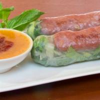 01. Nem Cuon (2 Rolls) · Two rolls. Grilled pork paste wrapped in rice paper with lettuce, cucumber, carrot, daikon, ...