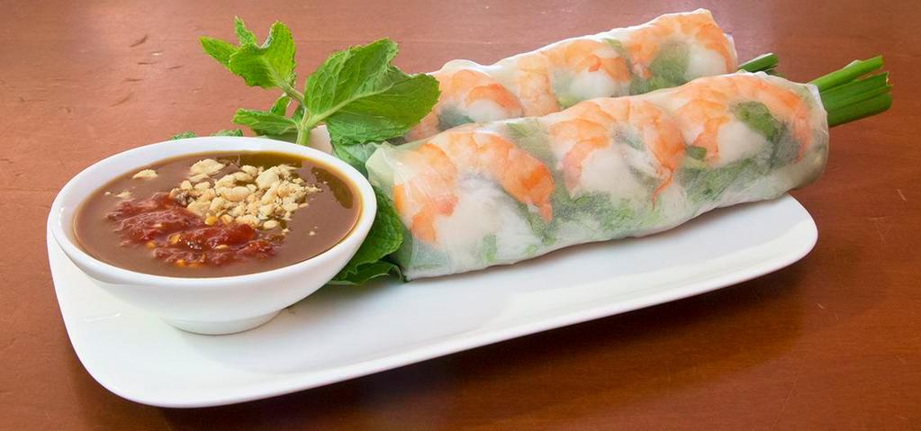 04. Goi Cuon (2 Rolls) · Two rolls. Steamed shrimp and pork wrapped in rice paper with vermicelli, lettuce, mint and bean sprout.