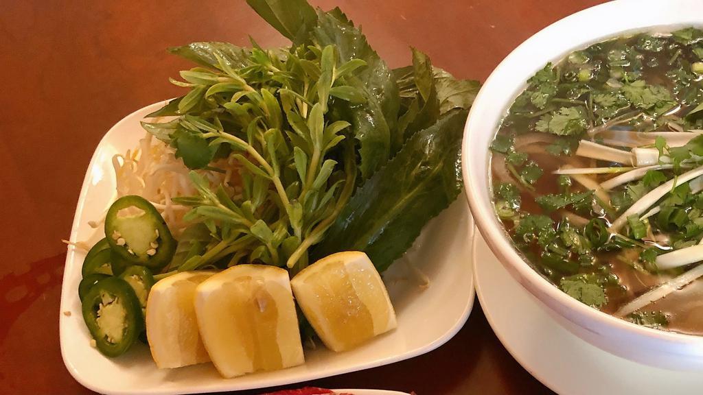 25. Pho Tai Nam (Large) · Rare flank steak and well done flank.