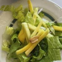 Mango Salad · Burmese dish. Fresh mango, cucumber, cilantro, onion, fried garlic, fried onion, and dried s...