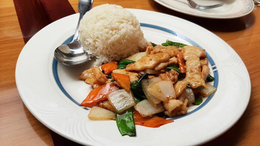 Spicy Basil Chicken · Burmese dish. White meat chicken, onion, snow pea, carrot, fresh chili, and basil sautéed with sweet and spicy sauce.