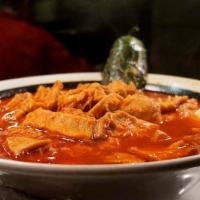 MENUDO · Honey combo pork tripe in a red chilli broth served with choice of feed feet and / or hominy...