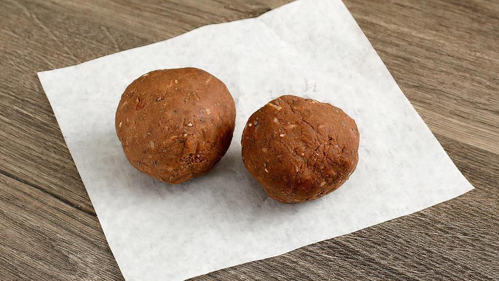 housemade protein ball · Almond meal raw cacao maple syrup chia seeds coconut oil coconut shreds peanut butter