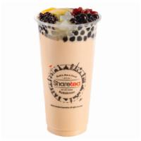 QQ Happy Family Milk Tea · Our signature classic milk tea with 6 toppings: Big Boba, Mini Boba, Pudding, Herb Jelly, Re...