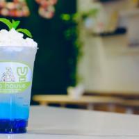 Blue Sky · Blue Raspberry and Vanilla, topped with whipped cream and maraschino cherries