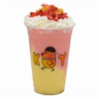 Tropical Yogurt · Pineapple and raspberry yogurt blended, topped with whipped cream and mixed fruit bits