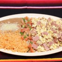 Huevos con Jamon · Ham and Eggs Served with Rice, Beans and Tortillas