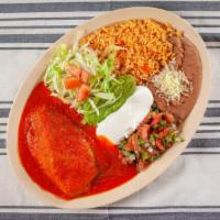 Chiles Rellenos Plate · Served with warm rice, beans, salsa, guacamole, sour cream and lettuce.
